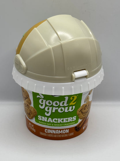 Good 2 Grow Snackers Baked Wheat & Oat Crackers Chocolate or Cinnamon with reusable snack tub and character head lid.